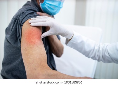 Side Effects Of Vaccine. Old Person Having Pain, Red Skin And High Temperature After Vaccination.