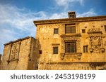 Side facade of the Diocesan College of Santo Domingo next to the Santo Domingo arch in Orihuela, Alicante, Valencian Community, Spain