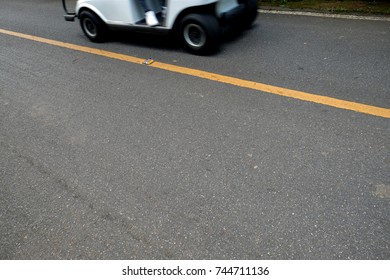 Side Of Golf Cart And Light On The Road