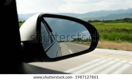side mirror of the car. reflection in the car mirro