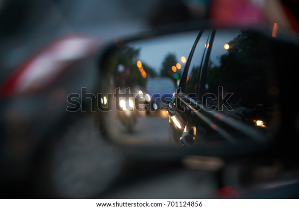 Side mirror driving at\
night.