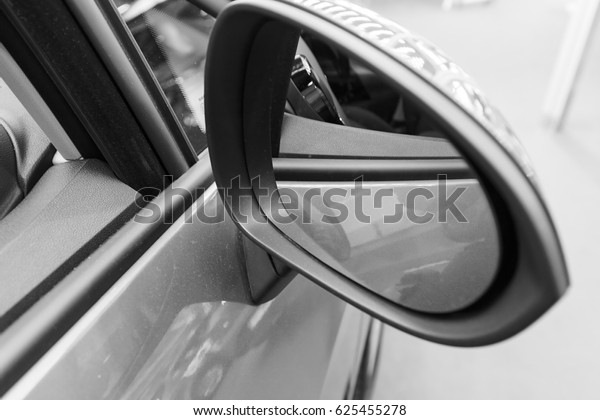 side mirror on the motor vehicle, note shallow\
depth of field