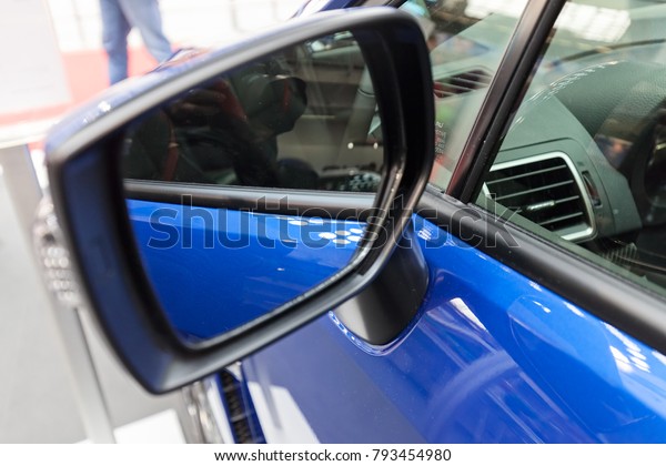side mirror on the motor vehicle, note shallow\
depth of field