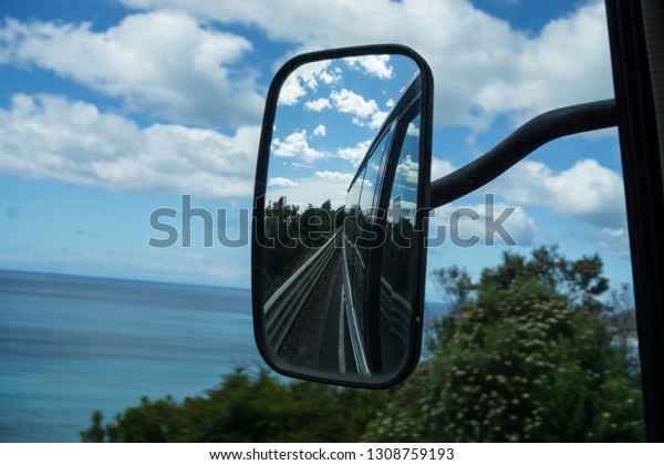 A side mirror from the
running car