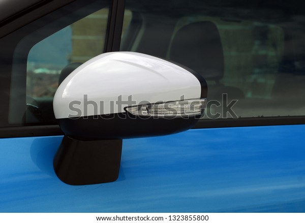 Side mirror with turn
signal of a car