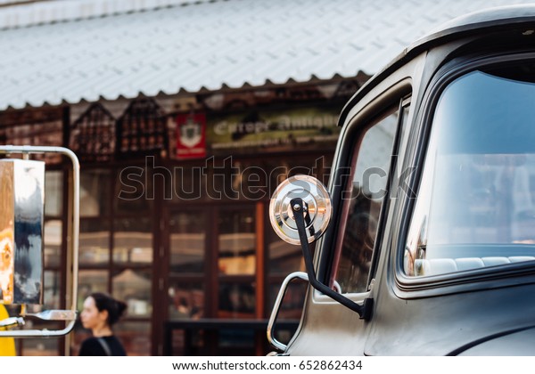 side\
mirror of a vintage car, vintage mirror of a\
car.