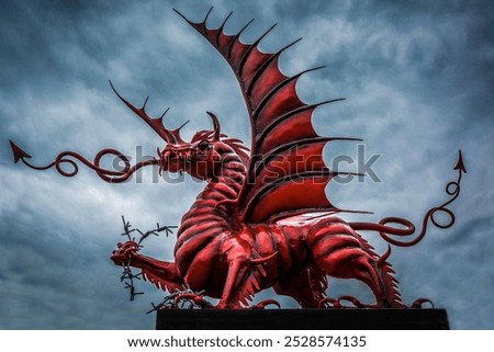 Side on view of the red dragon memorial to the 38th (Welsh) Division, Memetz Wood, Picardie, France