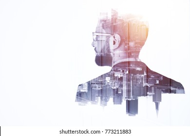 Side portrait of handsome young european businessman on abstract city background with copy space. Think and employment concept. Double exposure 