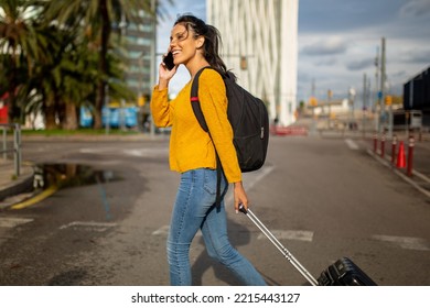 Side Portrait Happy Travel Woman Walking With Suitcase And Cellphone 