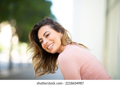 Side Portrait Happy Young Woman Leaning Outside