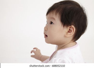 Side Profile Of The Chinese Baby Girl