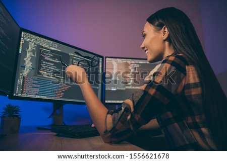 Side profile low below angle view photo of cheerful positive cute pretty girl in checkered shirt debugging system of her corporation