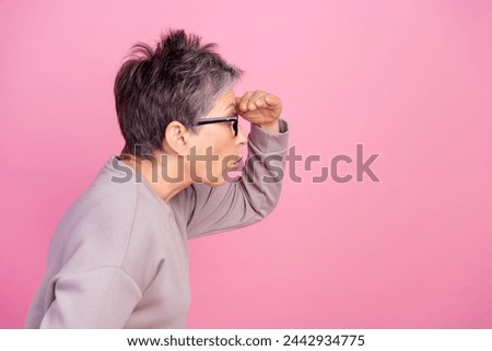 Side profile photo of excited business woman looking far away distant touch forehead copyspace open sale isolated on pink color background