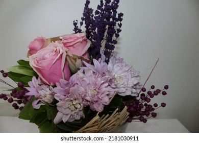 Side Profile Photo From Vibrant Flowers In Front Of A White Background, Behind Of A Bouquet Of Pink Roses, Pink Chrysanthemums, Purple Lavenders