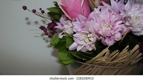 Side Profile Photo From Vibrant Flowers In Front Of A White Background, Behind Of A Bouquet Of Pink Roses, Pink Chrysanthemums, Purple Lavenders