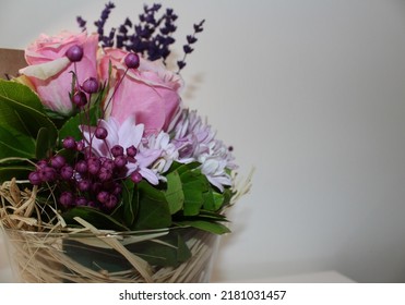 Side Profile Photo From Vibrant Flowers In Front Of A White Background, Behind Of A Bouquet Of Pink Roses, Pink Chrysanthemums, Purple Lavenders