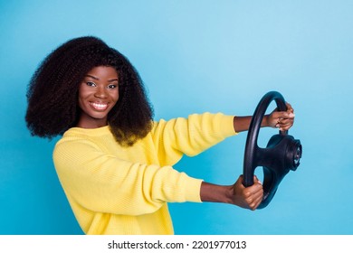 Side Profile Photo Of Young Driver Girl Hold Steering Wheel Looking You License Test Car Isolated On Blue Color Background