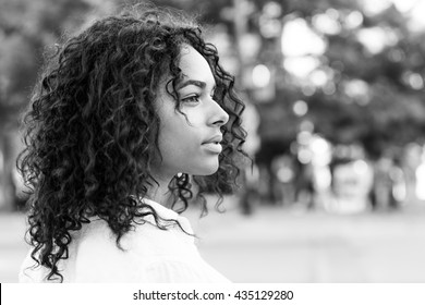 Side Profile Portrait Of Fashionable Young Attractive Black Woman With Afro 