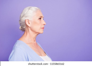 Side Profile View Portrait Of Beautiful Nice Content Serious Gray-haired Old Lady Wearing Casual. Isolated Over Pastel Violet Purple Background