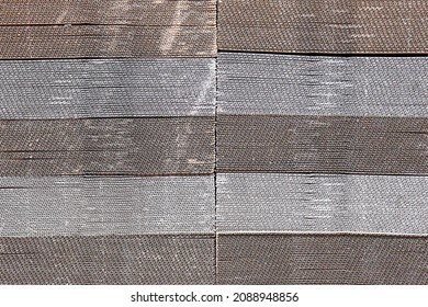 Side Section Of Stacked Corrugated Cardboard In Various Shades 