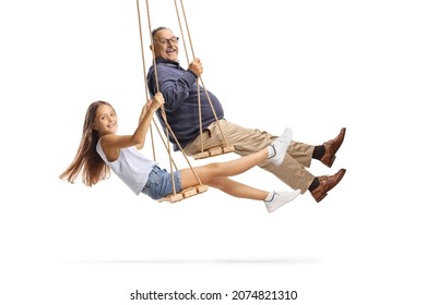 Side Shot Of A Grandfather And Granddaughter Swinging On Wooden Swings Isolated On White Background