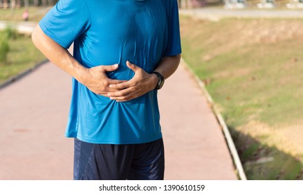 Side Stitch During Running, Close Up Young Man Holding Abdominal