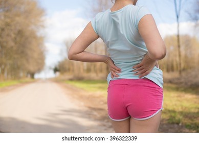 Side Stitch - Woman Runner Side Cramps After Running.