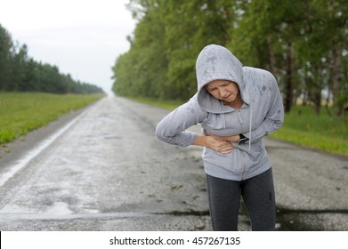 Side Stitch - Woman Runner Side Cramps.