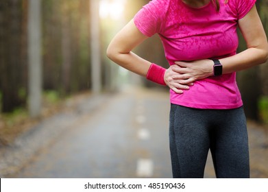 Side Stitch - Woman Runner Side Cramps. Marathon. 