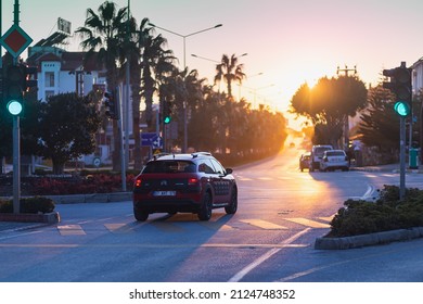 Side, Turkey -January 27, 2022:  Rd Citroën C4 Cactus  Is  Driving  On The Street On A   Sunset  Against The Backdrop Of A  Building, House 