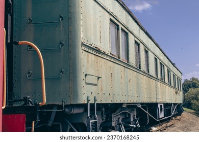 Side view of abandoned historic passenger rail car - Powered by Shutterstock