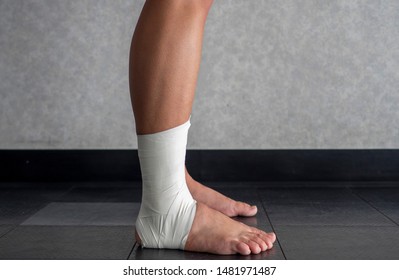  Side View Of An Ankle Tape Job On An Athlete’s Ankle 