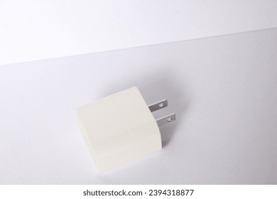 Side View of Apple 20W US Plug Wall Charger on White Background