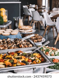 Side view arabic open buffet , chicken tikka , salad vegetable  And hummus and tabboleh and fatoosh yalng,