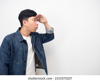 Side View Asian Man Jean Shirt Gesture Hand Over Head Excited Looking