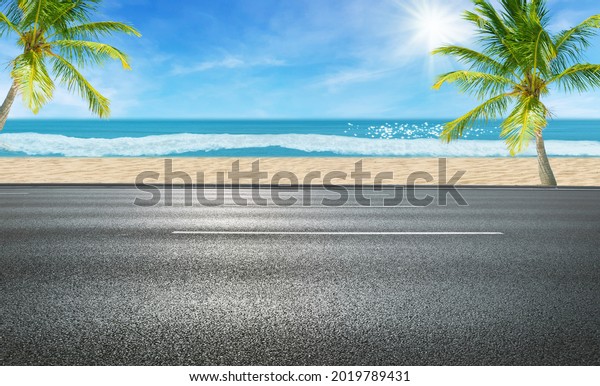 Side view of Asphalt\
straight street roadway of lanes with lines and seascape view in\
background.