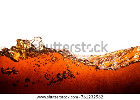 Side view background of refreshing cola flavored soda with bubbles isolated on white