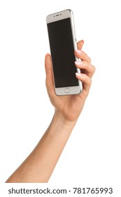 Side View Of Beautiful Relaxed Left Human Female Hand With Neutral Manicure Hold Blank Screen Smartphone In A Palm Isolated On Abstract Blurred White Background. Detailed Closeup Studio Shot