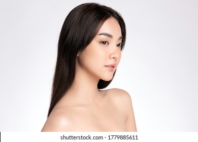 Side View Beautiful Young Asian Woman With Clean Fresh Skin, On White Background, Face Care, Facial Treatment. Cosmetology, Beauty And Spa. Asian Women Portrait