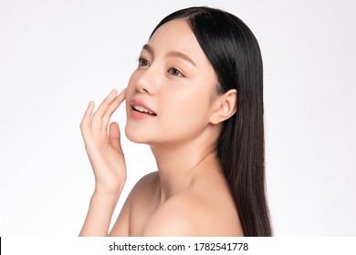 Side view Beautiful Young asian Woman with Clean Fresh Skin, on white background, Face care, Facial treatment. Cosmetology, beauty and spa. Asian women portrait