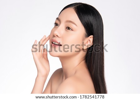 Side view Beautiful Young asian Woman with Clean Fresh Skin, on white background, Face care, Facial treatment. Cosmetology, beauty and spa. Asian women portrait 商業照片 © 