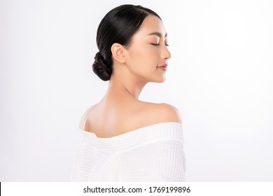 Side View Of Beauty Woman Face Portrait, Beautiful Young Asian Woman With Clean Fresh Healthy Skin, Facial Treatment. Cosmetology, Beauty And Spa, Isolated On White Background.