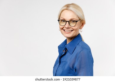 Side View Of Blonde Successful Confident Employee Business Woman 40s In Blue Classic Shirt Glasses Formal Clothes Look Camera Isolated On White Background Studio Portrait. Achievement Career Concept