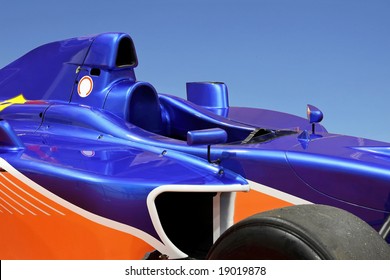 Side View Of Blue Formula One Racing Car