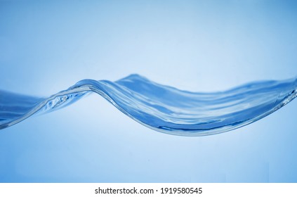 Side view of blue water waves.