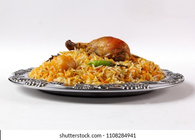 Side View Of Bombay Biryani In Silver Plate, Traditional Spicy Indian Food, Iftar Meal, Ramadan Dinner On White Background.