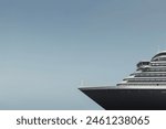 A side view of the bow of a large luxury cruise ship,
