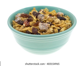 Side View Of A Bowl Filled With Pecans, Raisins And Dates Breakfast Cereal Isolated On A White Background.