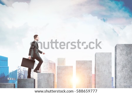 Side view of a businessman holding a suitcase and accending a giant bar chart. There is a city in the background. Toned image. Mock up.