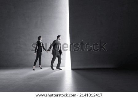 Woman Walking Through Building